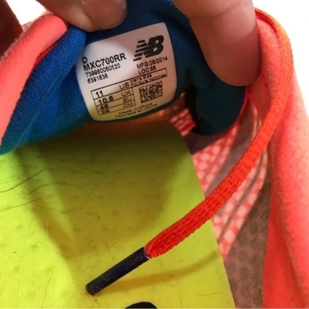Women’s 11 New Balance Kick XC running shoe
